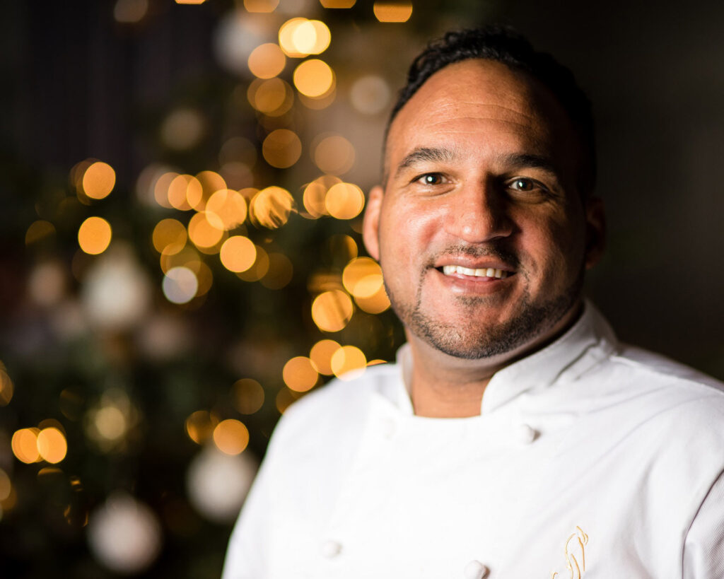 Michael Cains at a Christmas event in Lympstone Manor